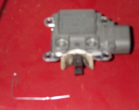 1993 Mercury Grand Marquis - When you go to reinstall the regulator the brushes have to be held back into the housing. Use a paper clip to hold them in place.