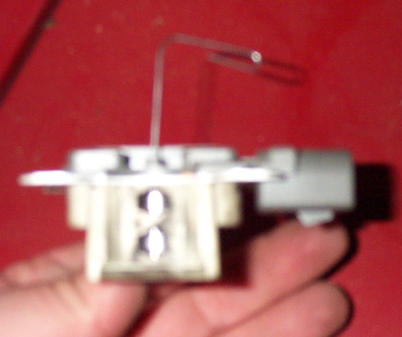 Another view of the brushes held in place