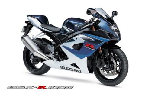 2002 Kawasaki Ninja - A blue and white Suzuki GSX-R1000 motorcycle is shown from a three-quarter front view against a white background.