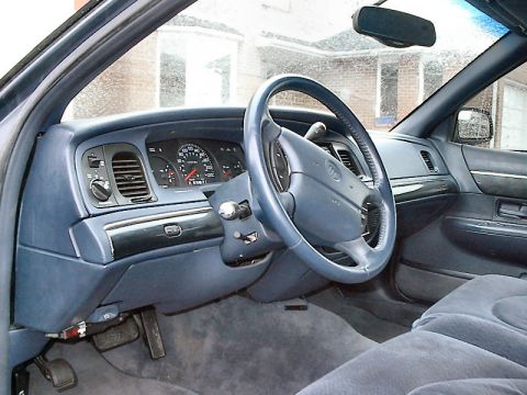 1985 Mercury Grand Marquis - Interior of a 1995 Mercury Grand Marquis, the dashboard and steering wheel.
