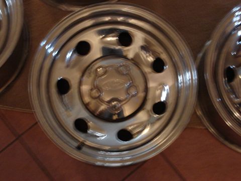 2000 Ford Crown Victoria - Close-up of a Ford wheel hubcap, likely from a truck or older SUV.