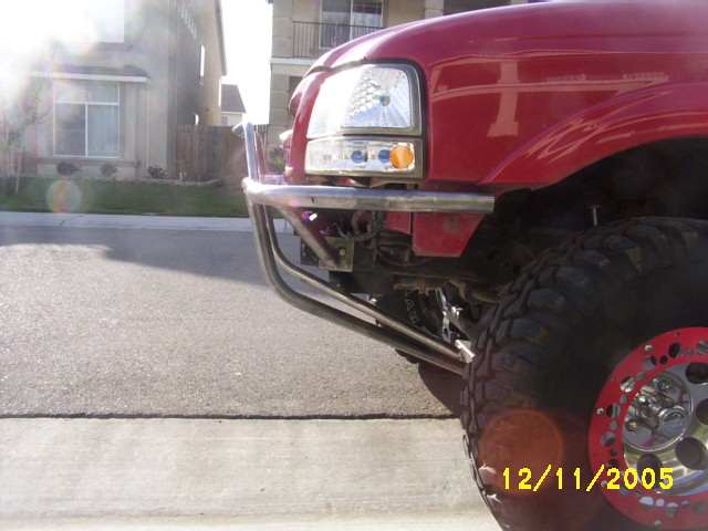 2000 Ford Ranger front corner with custom metal bumper and large tire