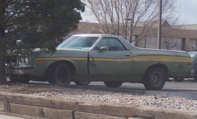 1972 Ford Ranchero - A 1972 Ford Ranchero with a distinctive two-tone paint scheme is seen from the side.