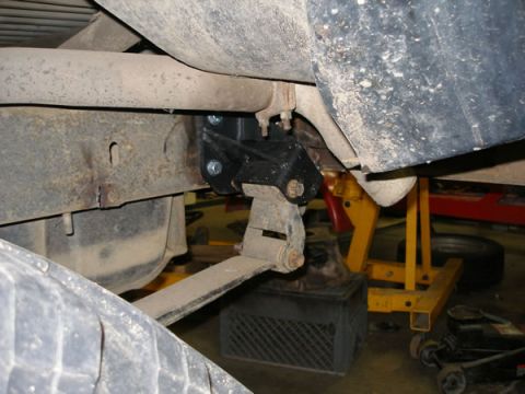 1994 Ford Bronco - When installing, you might find yourself wishing you had droped the tank. Some advise, use a "uni-bit" to enlarge the bolt holes.