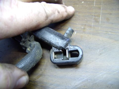 1990 Lincoln Town Car - Here's the backview of the socket. In theory you're meant to deperss the spring with your thumbnail and allow the other side to click onto…