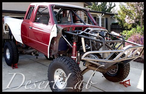 1977 Ford F-150 - This heavily modified truck features a custom roll cage and suspension system, indicating it's built for off-road use.