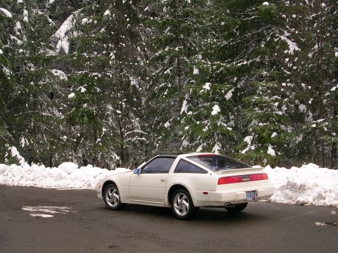 1989 Nissan 300ZX - White 1989 Nissan 300ZX parked near a snow-covered forest road.