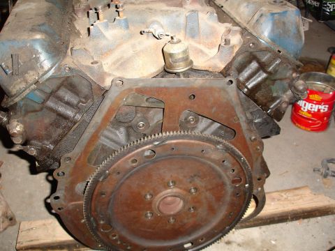 1979 Ford F-150 - Close-up of an engine block and flywheel assembly, showing the starter ring gear.