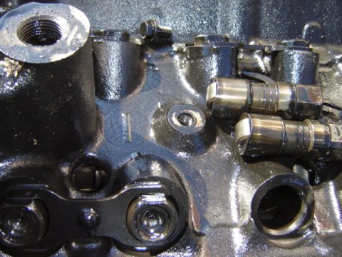 1992 Ford Bronco - This image shows engine valve lifters and parts of the engine block, not a 1992 Ford Bronco.