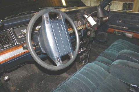 1991 Ford Crown Victoria - Interior view of a 1991 Ford Crown Victoria, likely a police interceptor model.