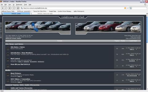 1993 Ford Taurus - A collection of vehicles is displayed on a forum index page.