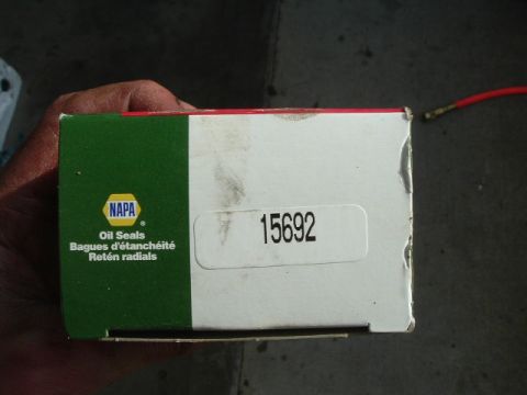 1989 Ford Bronco - A hand holds a NAPA box labeled 'Oil Seals' and part number 15692.