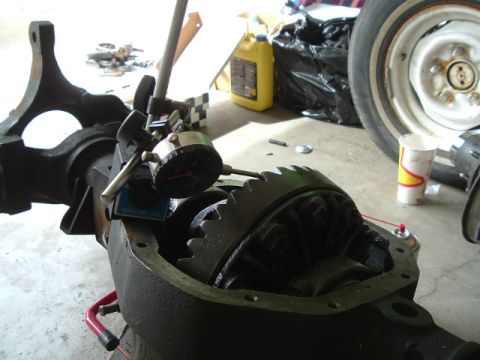 1989 Ford Bronco - Differential housing being measured with a dial indicator, likely for a regear or rebuild process.
