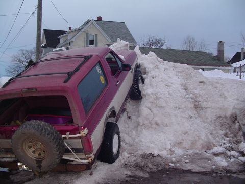 1994 Ford Bronco - Ford Bronco stuck in a snowbank after a heavy snowfall.