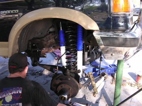 1988 Ford Bronco - Installing new shocks and springs on a 1988 Ford Bronco as part of a lift kit.