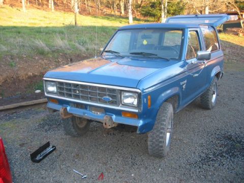 1991 Ford Explorer - Blue Ford Bronco II parked outdoors with the rear hatch open.