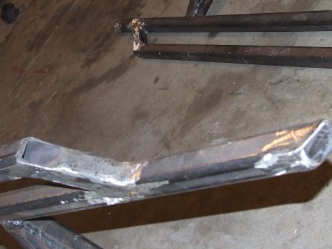 1986 Ford Bronco - Close-up of welded metal tubing, likely for custom rock sliders.