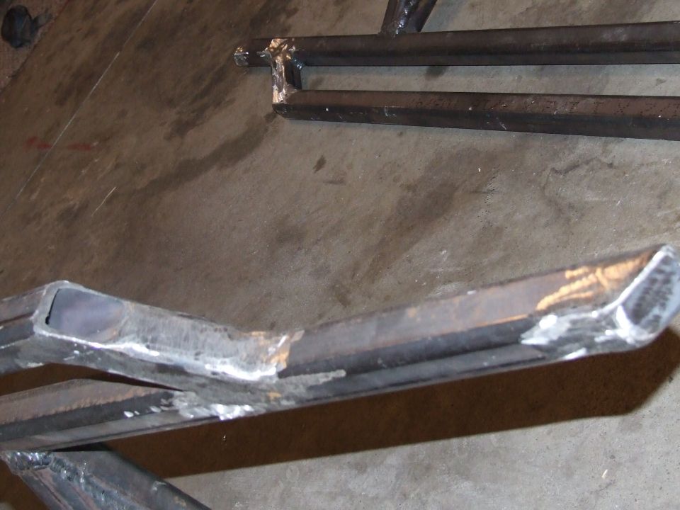 Metal tubing with welds, part of custom rock sliders