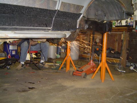 1989 Ford Bronco - Grinding rivets off of the spring buckets