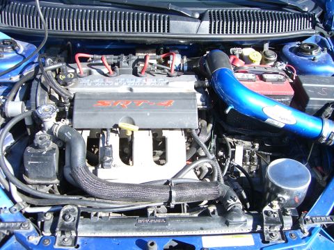 1996 Ford Probe - The engine bay displays SRT-4 badging, indicating a performance variant, but no year-specific details are visible.