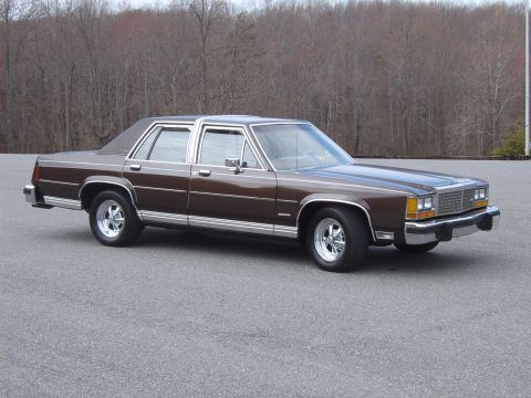 1982 Ford Crown Victoria LTD - This 1980s Ford sedan features chrome trim and aftermarket Cragar SS wheels.