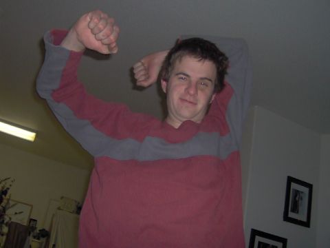 1996 Ford Probe - Man poses for a photo, flexing his arm.
