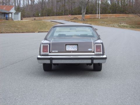 1982 Ford Crown Victoria LTD - Rear view of a 1982 Ford Crown Victoria LTD, Cragar SS wheels and the license plate JTY-7175.