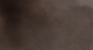 1991 Ford LTD Crown Victoria - A close-up view of a textured material, possibly a car interior trim piece.