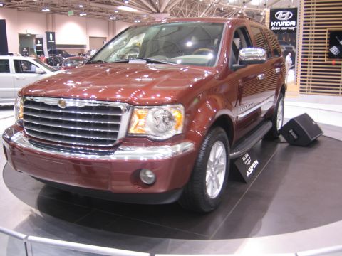 1999 Ford Crown Victoria - This Chrysler Aspen is displayed on a rotating platform at an auto show.