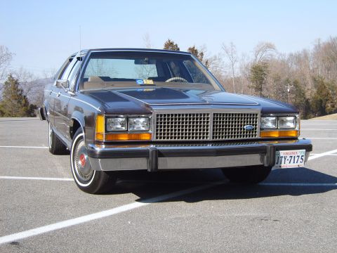 1982 Ford Crown Victoria LTD - This 1982 Ford Crown Victoria LTD is shown from the front in a parking lot.