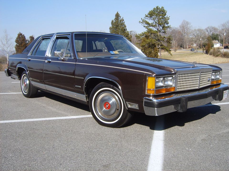 Brown 1983 Ford LTD Crown Victoria parked outside