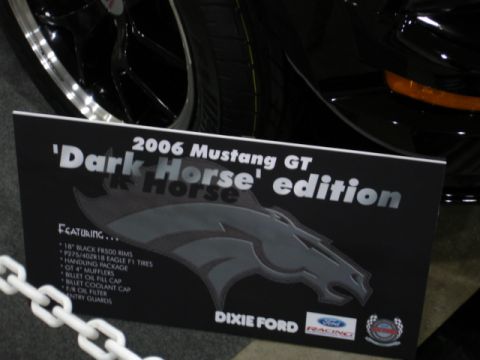 1981 Ford Mustang - Sign details the 'Dark Horse' edition of a 2006 Mustang GT, including its features and Dixie Ford branding.