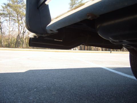 1982 Ford Crown Victoria LTD - Undercarriage view focusing on the exhaust system and frame components.