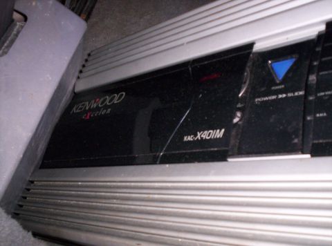 1995 Ford Bronco - A Kenwood KAC-X401M amplifier is visible, likely installed in a vehicle's interior.
