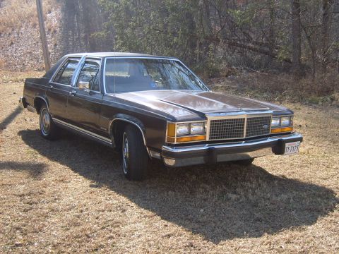 1982 Ford Crown Victoria LTD - This 1980 Ford Crown Victoria sedan is shown from the front three-quarter angle.