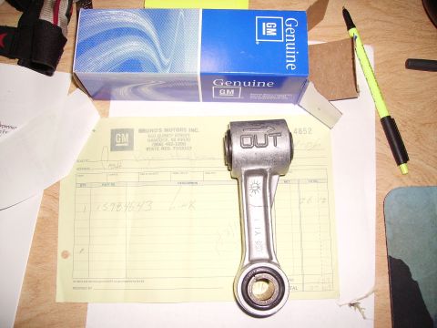 2000 Chevrolet Tahoe - A GM Genuine Parts box sits next to a suspension link and a receipt from Bruno's Motors Inc.