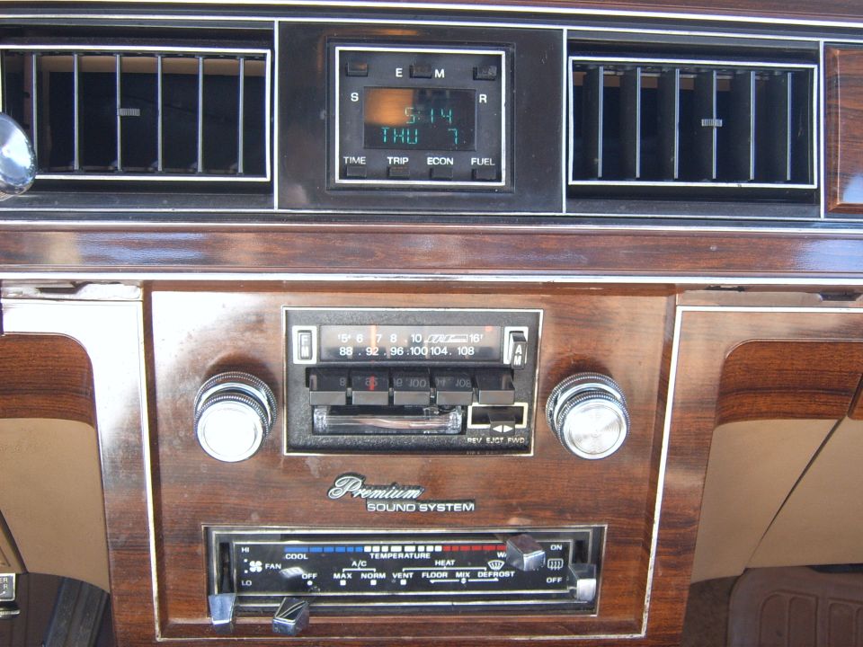 1982 Ford Crown Victoria LTD interior dashboard with digital clock and premium sound system