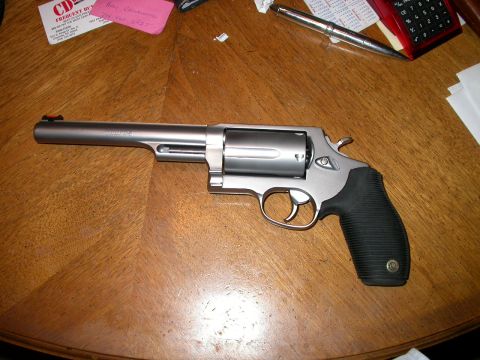 1990 Ford Bronco - My new tractor gun, Taurus M410 Tracker. Stainless, chambered in 45 Long Colt & .410 guage shotgun. 6 1/2" barrel, with orange high-viz fro…