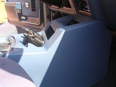 1986 Ford Bronco - Custom center console with CB radio installed in a 1986 Ford Bronco interior.