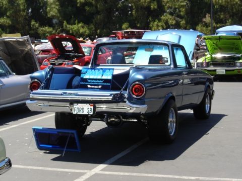 1972 Ford Ranchero - Customized 1960-1963 Ford Falcon/Ranchero pickup at a car show, rear view.