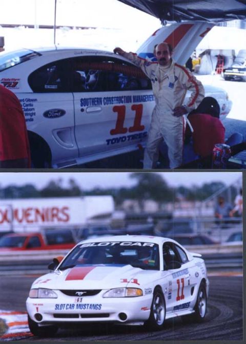 1995 Ford Mustang - A white 1994 Ford Mustang race car with red stripes and the number 11 is shown on the track.