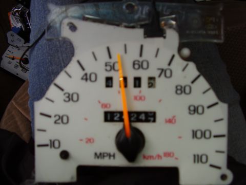 1997 Ford Taurus - Close-up of a car's speedometer gauge, showing speed and odometer readings.