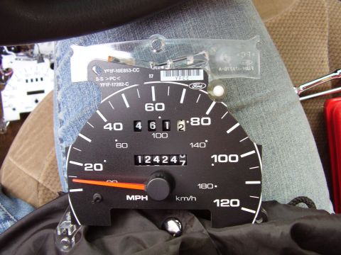 1997 Ford Taurus - A 1997 Ford Taurus gauge cluster is shown, displaying the odometer and tachometer readings.