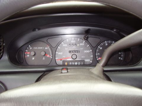 1997 Ford Taurus - The instrument cluster of a 1997 Ford Taurus displays mileage and fuel level.