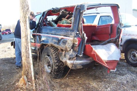 1977 Ford F-150 - This SUV sustained significant rear-end damage, with its body and windows broken.