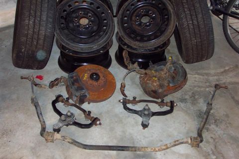 1985 Ford LTD Crown Victoria - '92-'94? frame mount upper A arms - '98+ lower ball joints, spindles, and eveything attached