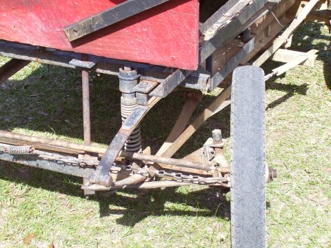 1992 Ford Bronco - Close-up view of a vehicle's suspension system and chassis components.