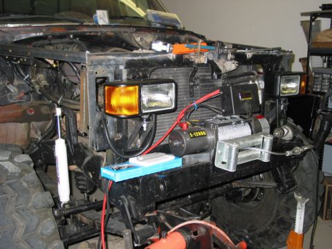 1981 Ford Bronco - Front end of a 1981 Ford Bronco modified with a winch and aftermarket lighting.