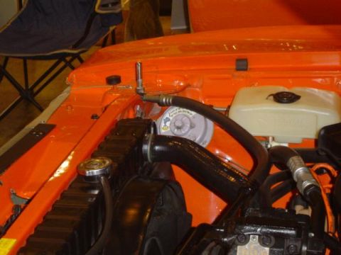 1979 Ford Bronco - Close-up view of an engine bay, showing various components like the radiator and hoses.