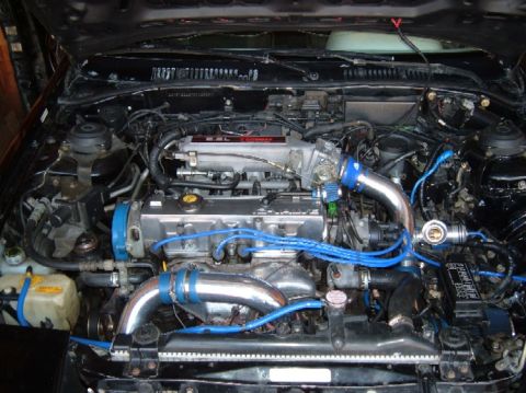 1989 Ford Probe - Engine bay view showing the 2.5L engine and various components.